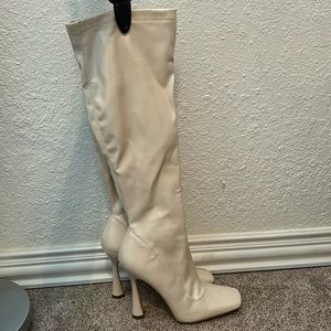 Nude heeled boots